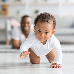 Adorable Black Baby Crawling Developmental Milestones